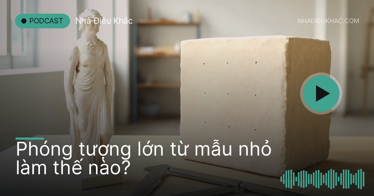 Mẫu tượng thạch cao nhỏ đặt cạnh khối đá lớn có những chấm đánh dấu